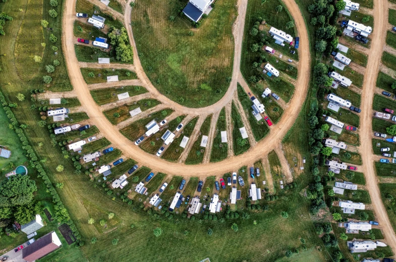 a circular ring sits in the middle of a field