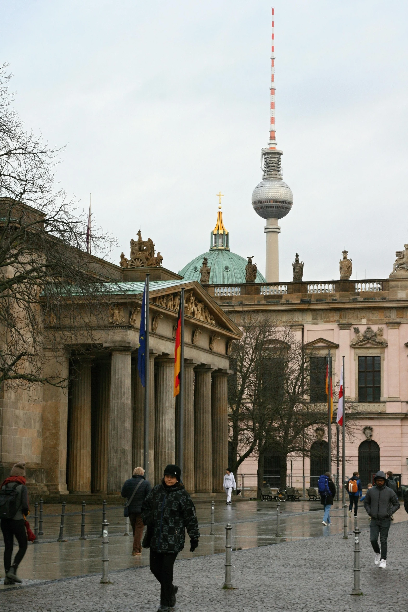 a tall building sitting next to an obelisk