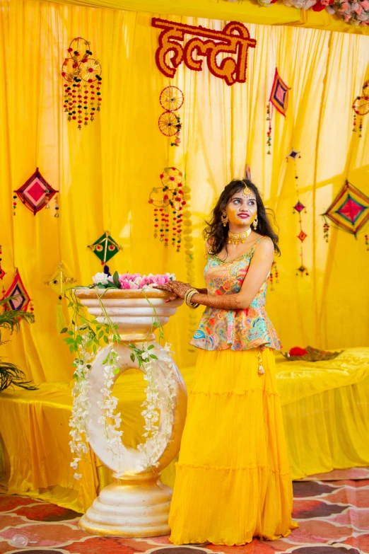 a woman holding onto her cake with an elaborate decoration