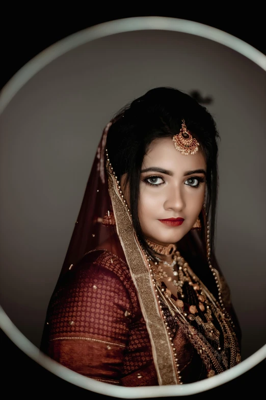 a beautiful young woman in a bridal wedding gown