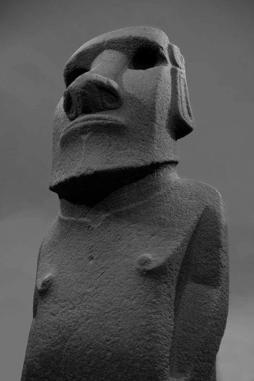 black and white po of stone statue with neck scarp