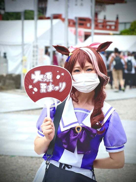 anime girl in costume with mask and fan
