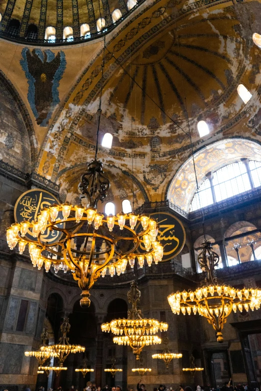 chandeliers and light fixtures in an ornate building