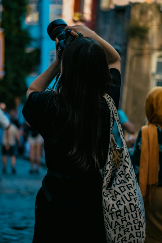 a lady looking through her hand held binoculars