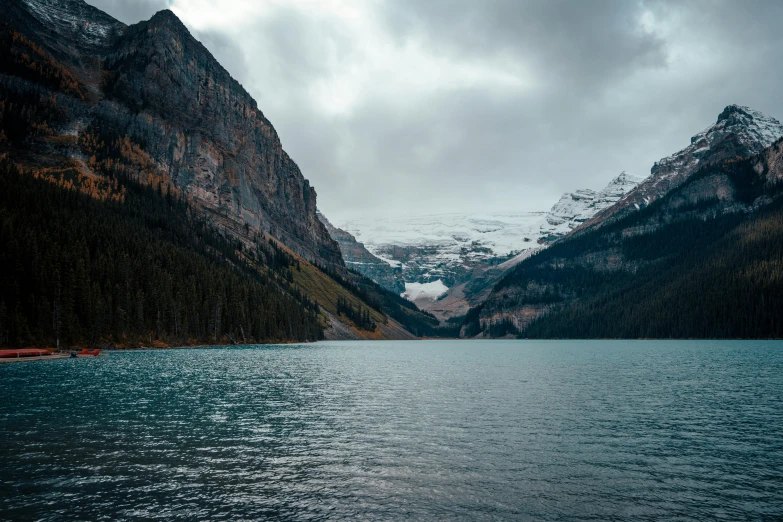 lake and mountain covered in snow in early fall