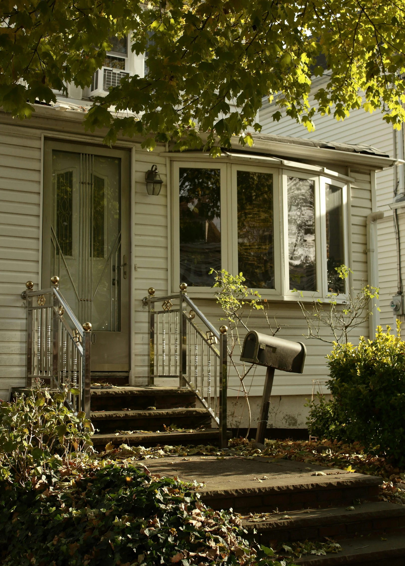 a white door and stairs of a house