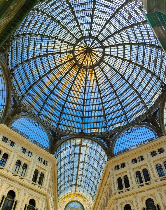 the interior of an empty building with several glass domes