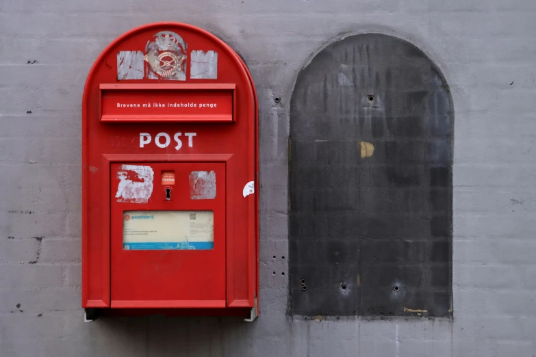 the bright red mailbox has its front open