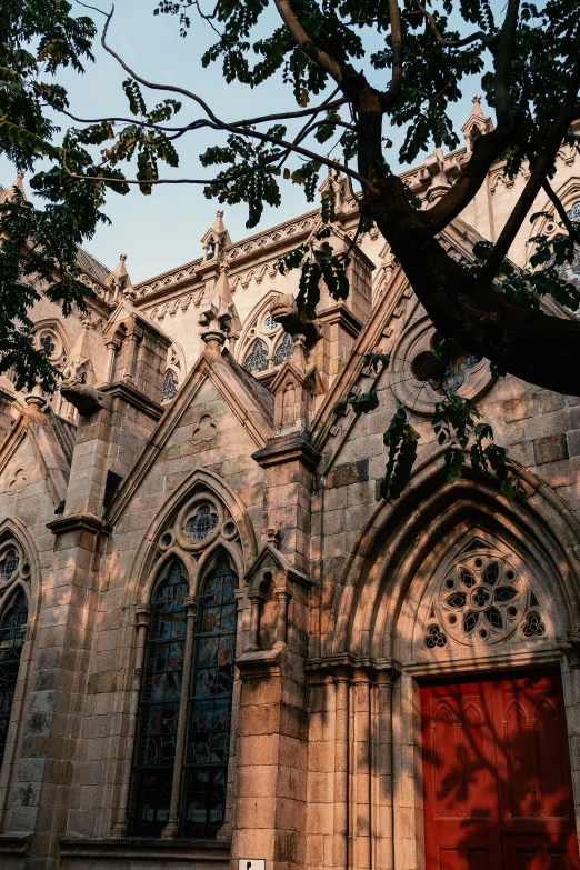 an old cathedral with very tall windows is shown