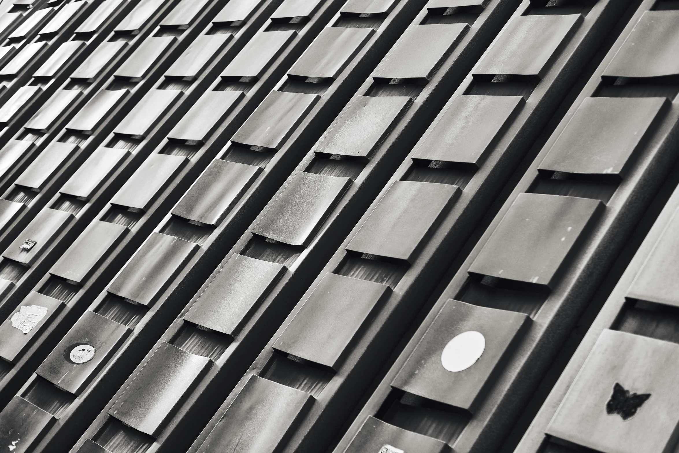 a black and white po of a building with holes in the side