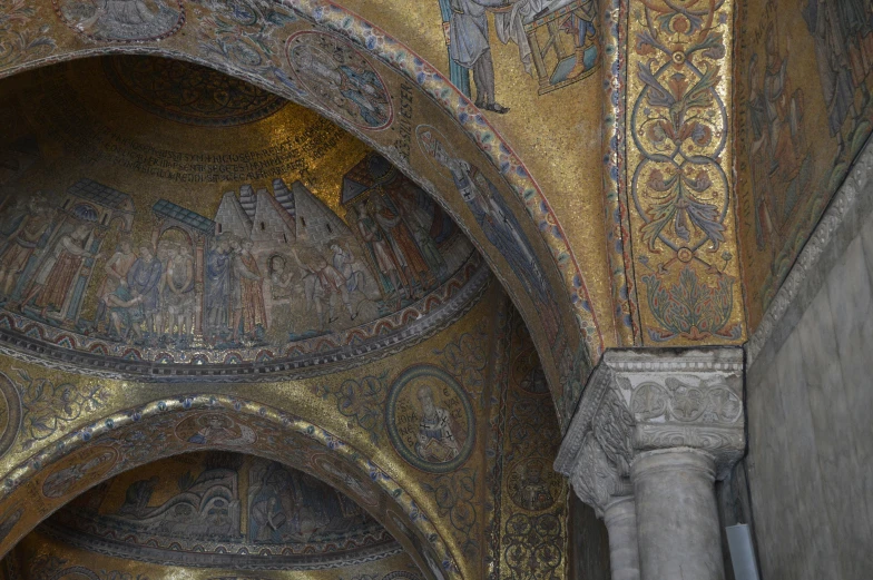 an artistic wall and arches in a building