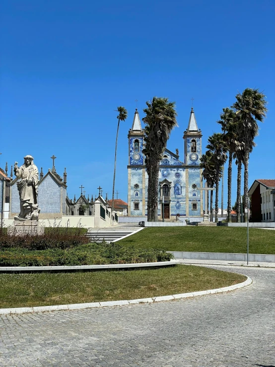 a clock tower in the middle of a square