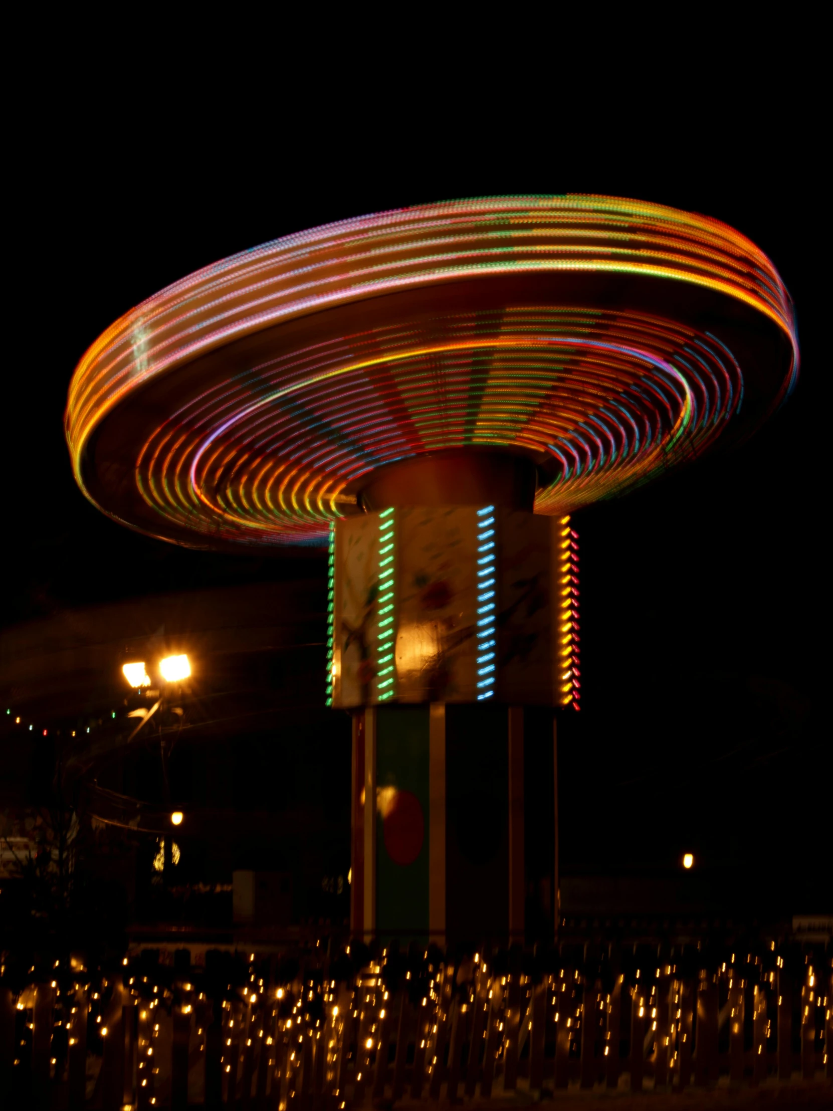 a large merry go round at night time