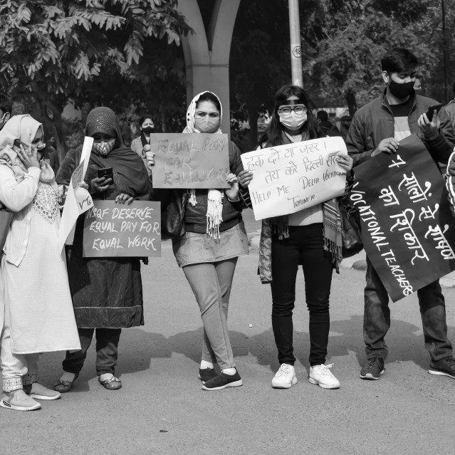 black and white pograph of people protesting in protest