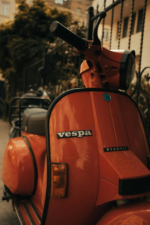 this motorcycle has a logo on it and its tires are made out of metal