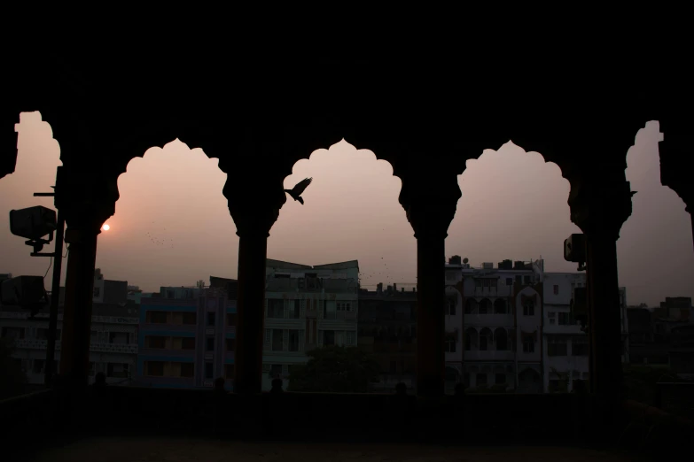 a large window with a view of city buildings