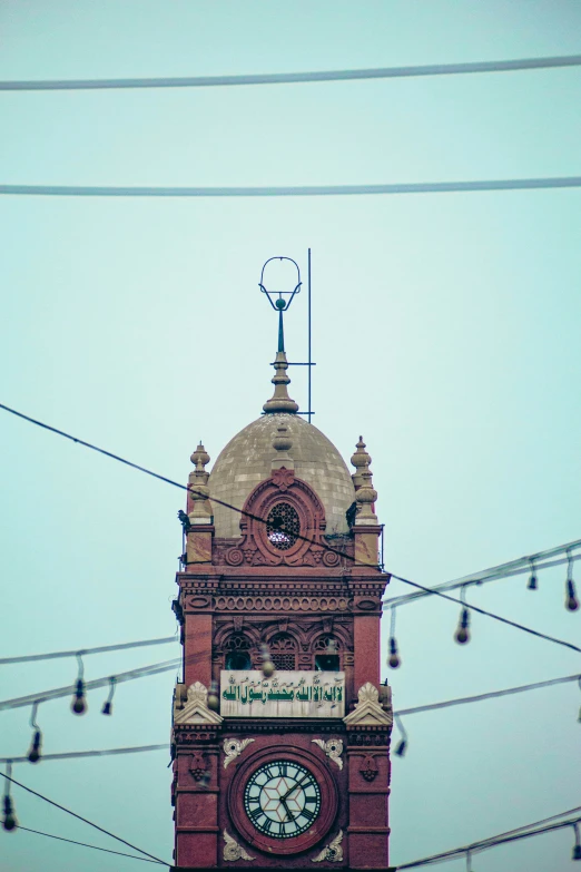 a large clock tower towering over a city