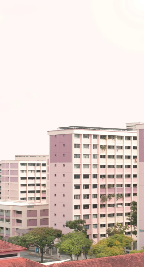 two large buildings on the edge of a river