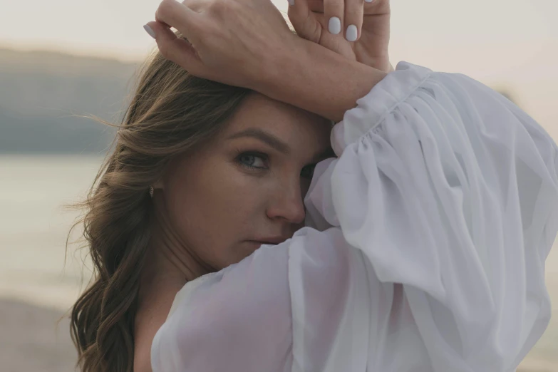 a close up of a person holding her hand