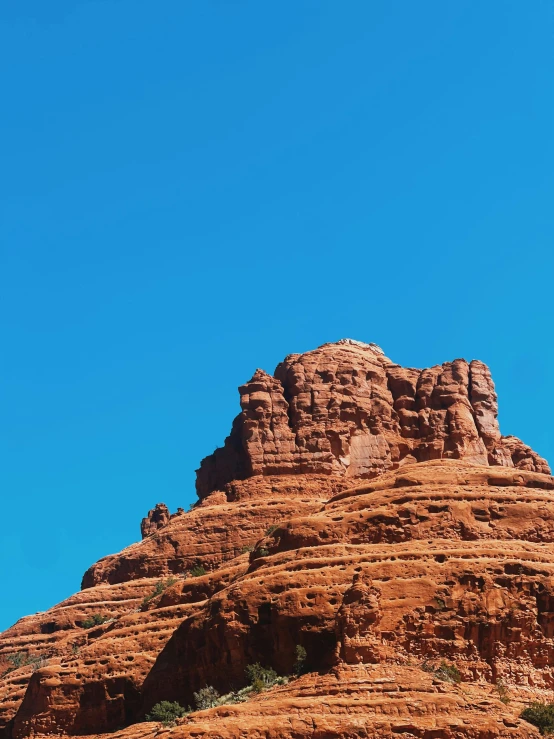 red rocky mountains against a blue sky