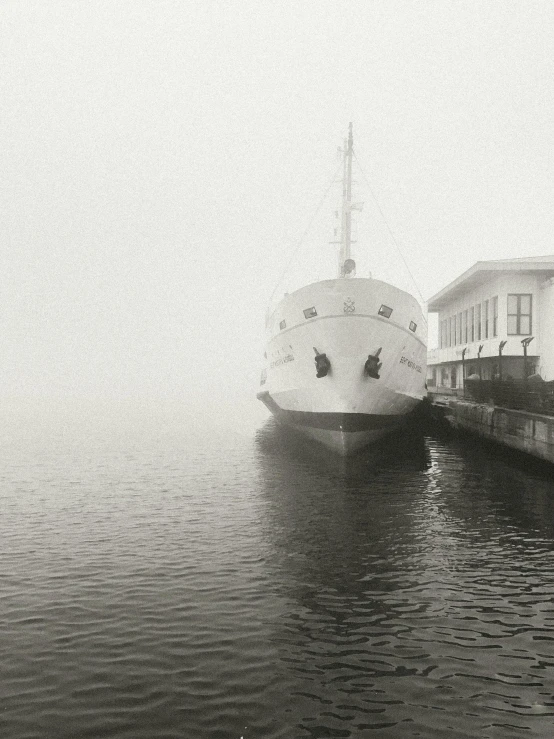 the boat is docked in a canal