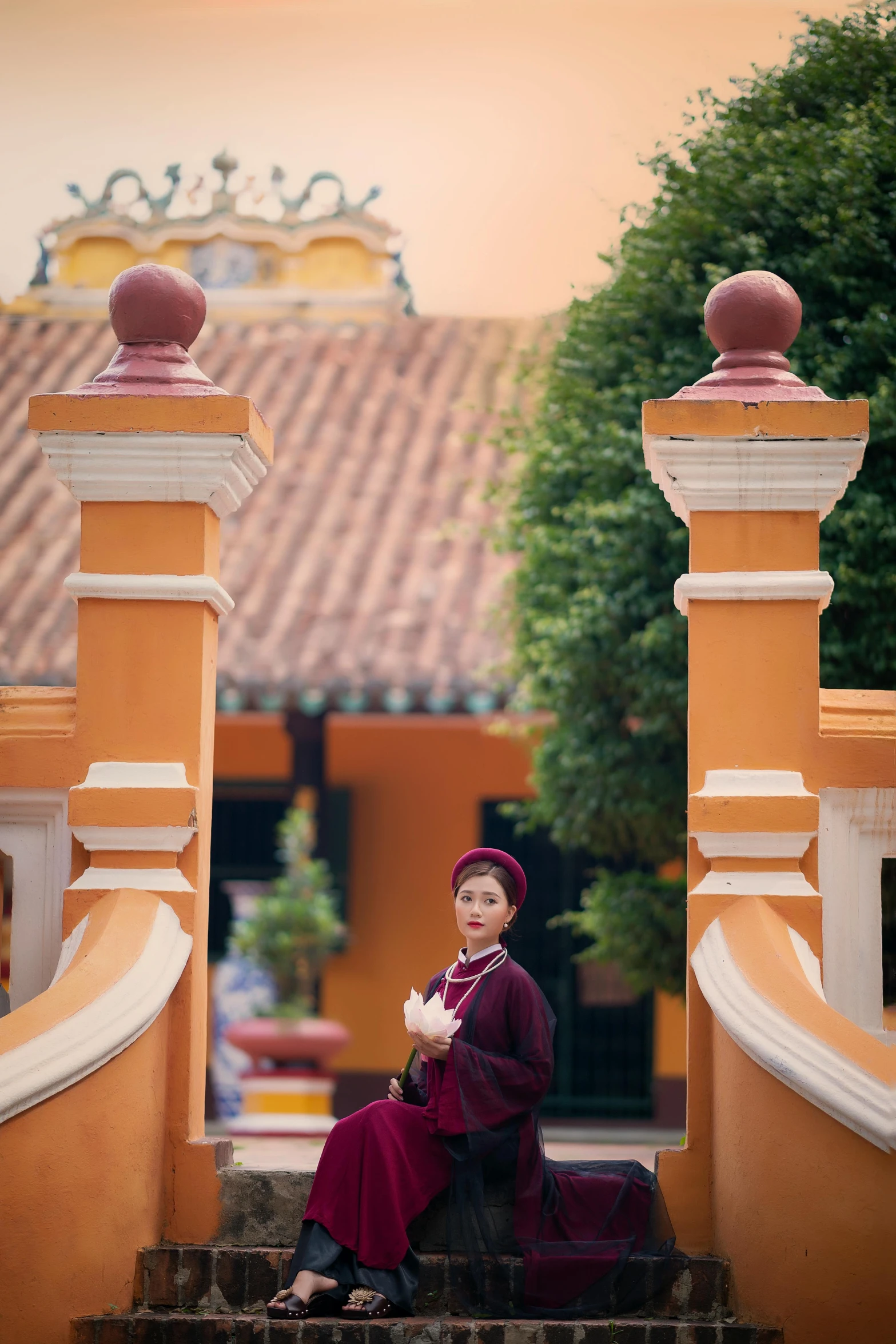 a women who is sitting on some stairs