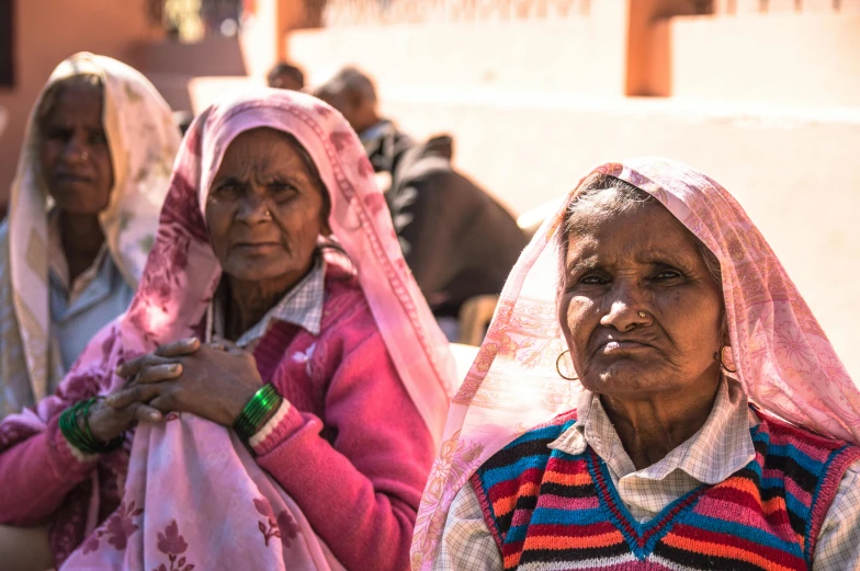 women of many indian ethnicities in colored clothing