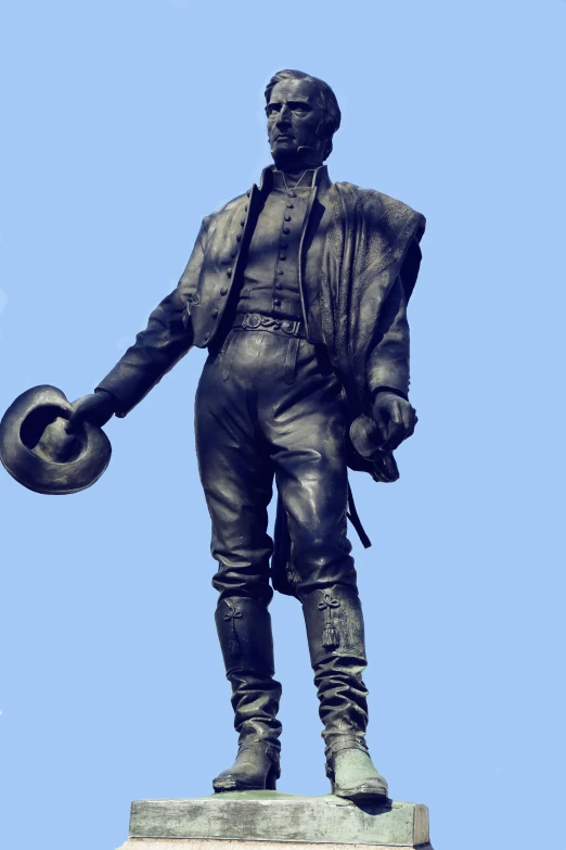 a statue of a man wearing a jacket and holding a ball