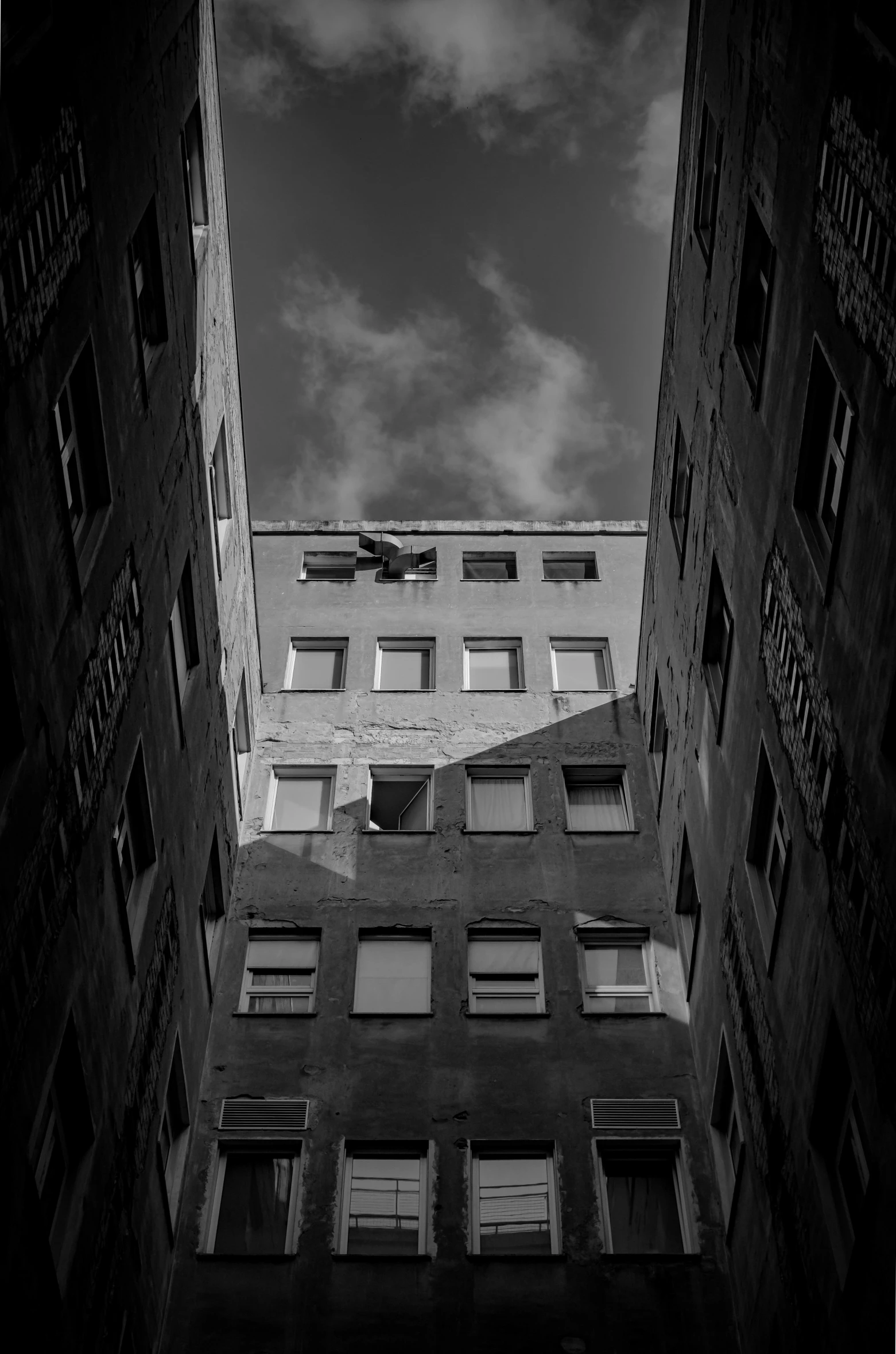 buildings with windows viewed up high in the sky