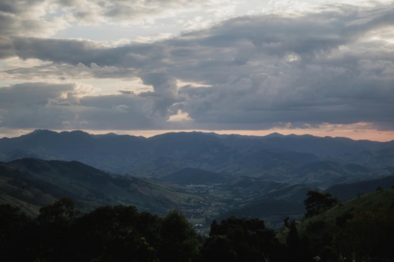 a view from a hill of a mountainous area