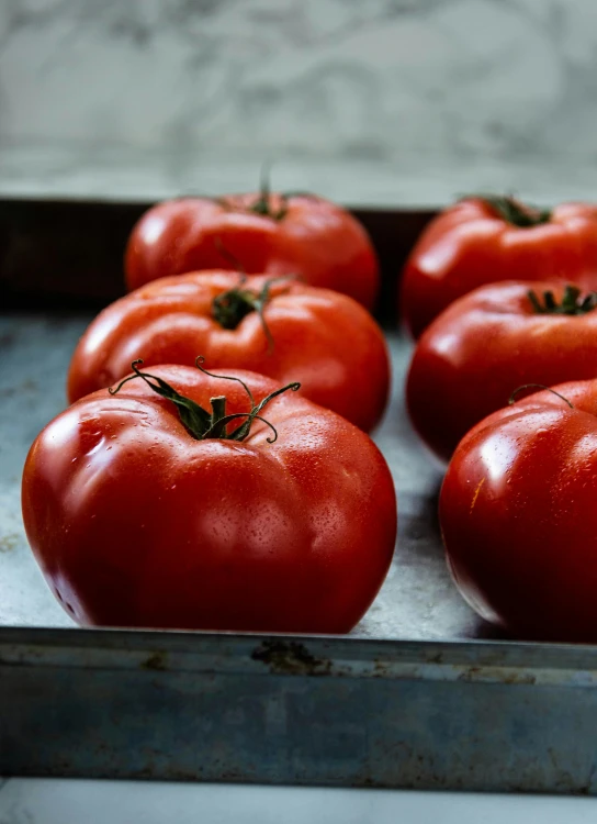 the tomatoes have been prepared for cooking in the oven