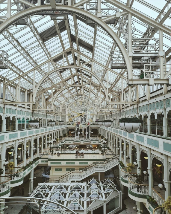 the inside view of an indoor shopping mall