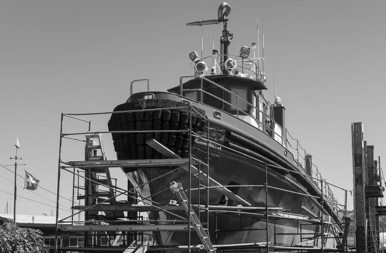 an old boat is being constructed to look like a ship