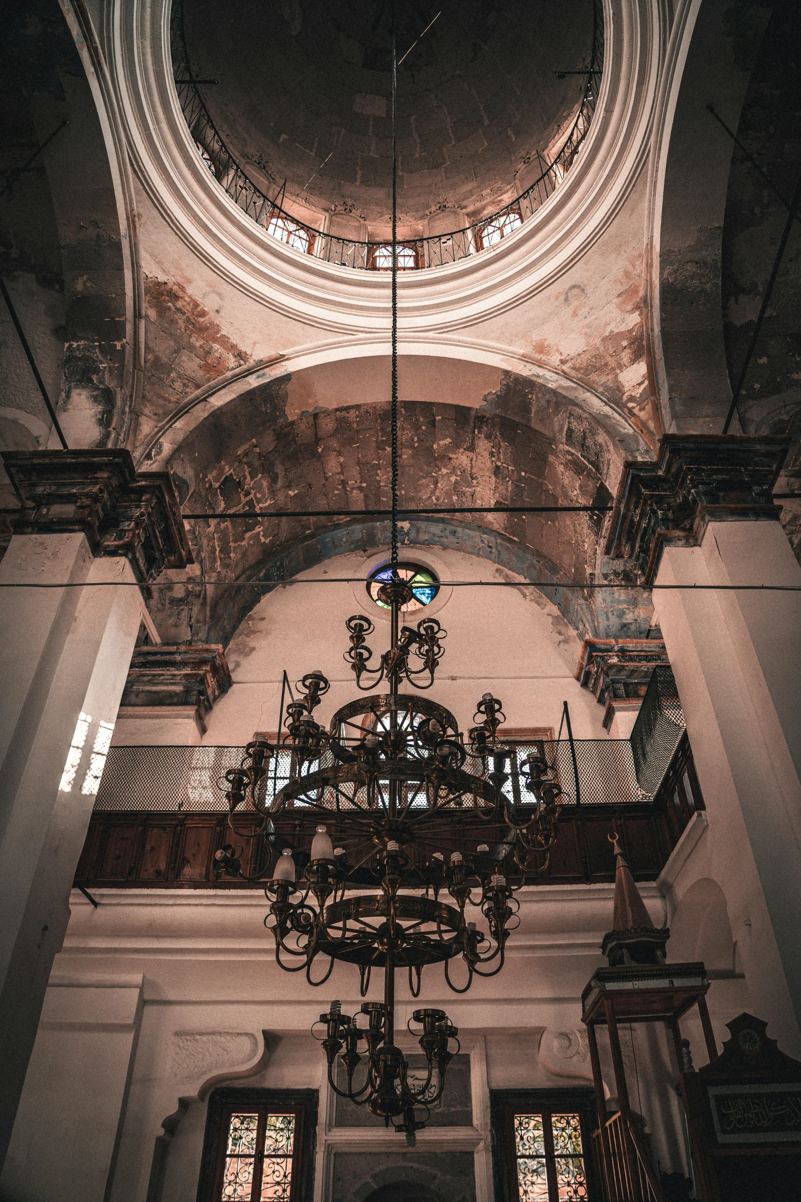 the ceiling and windows inside an ornate church