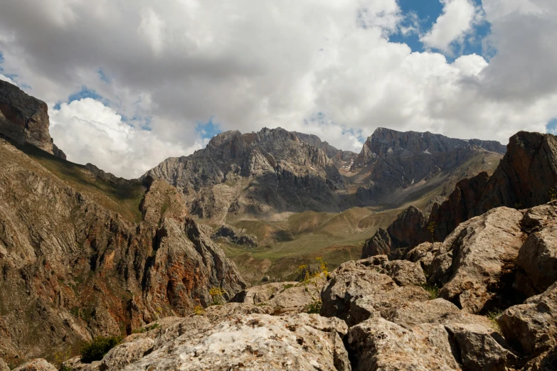 a view of rocks from the top of the mountain