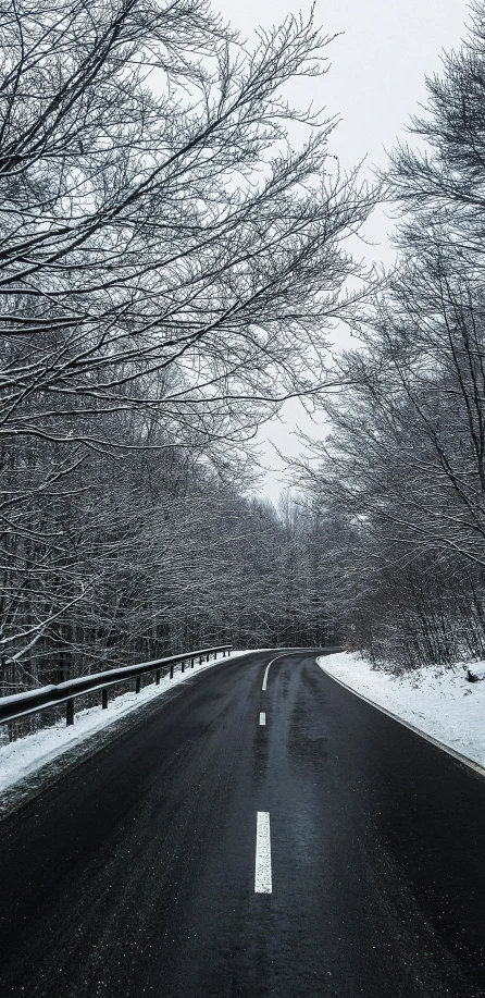 road to nowhere at night on snowy day