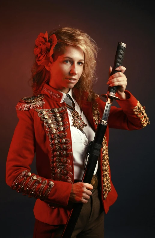 young woman in elvis costume holding rifle on dark background