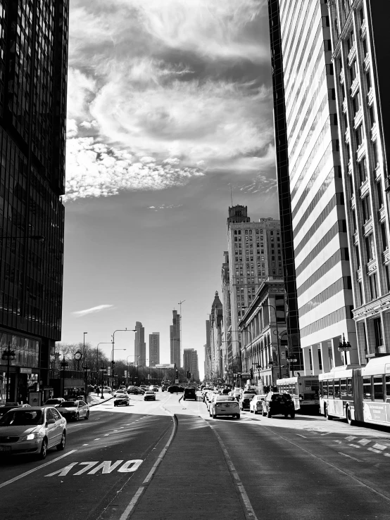 the city is crowded with many cars and pedestrians