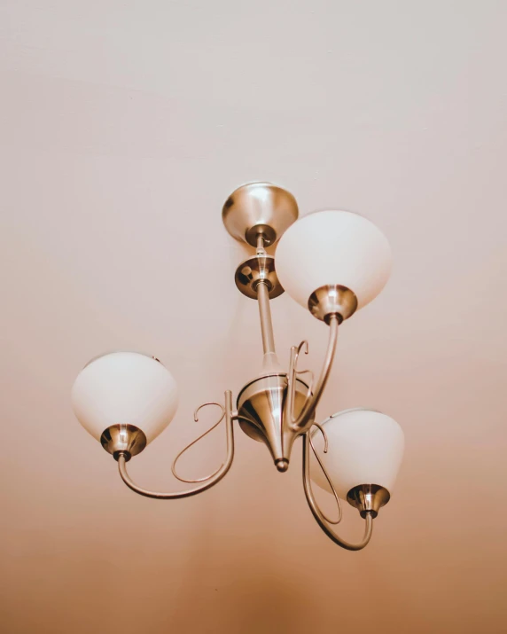 a chrome ceiling light has five lights