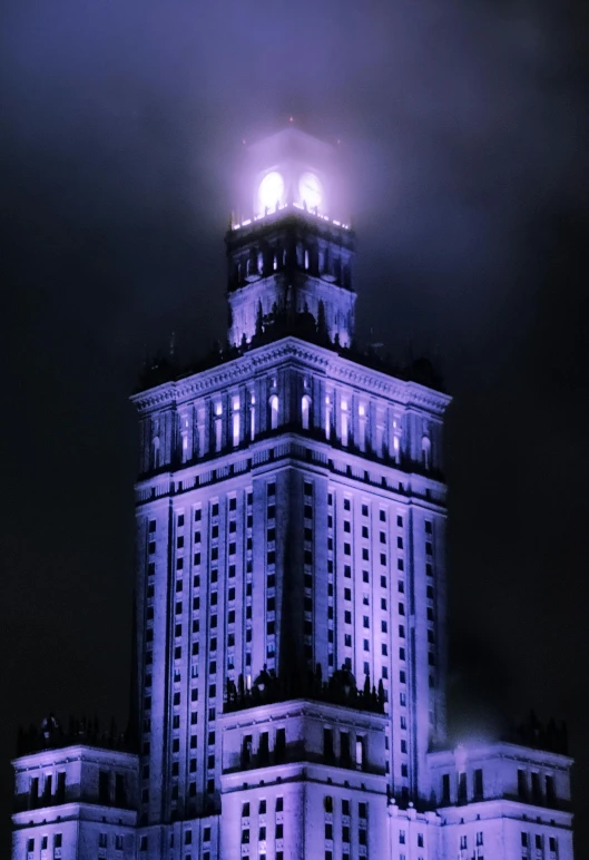 the illuminated building has lights on at night