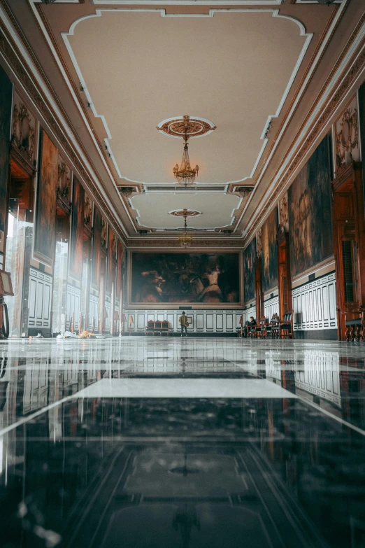 marble floors of an elegant el lobby with antique wooden paneling