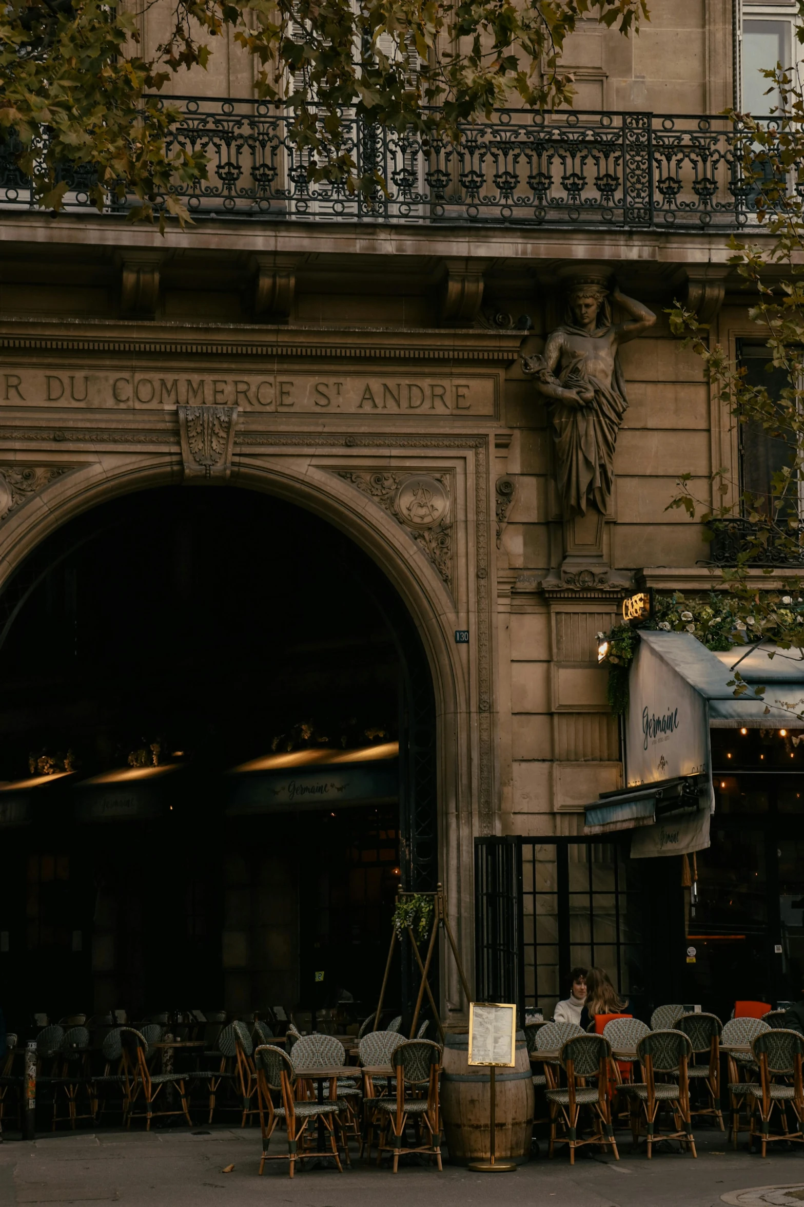 a very pretty building with a tall gate