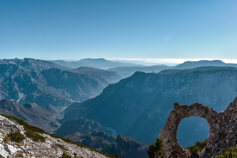 looking down at the mountain tops from high in the mountains