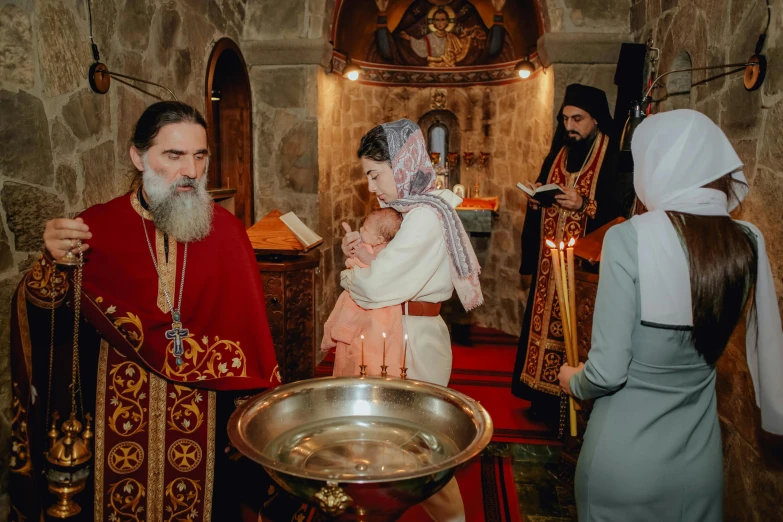 two men and one woman in roman garb are talking to each other