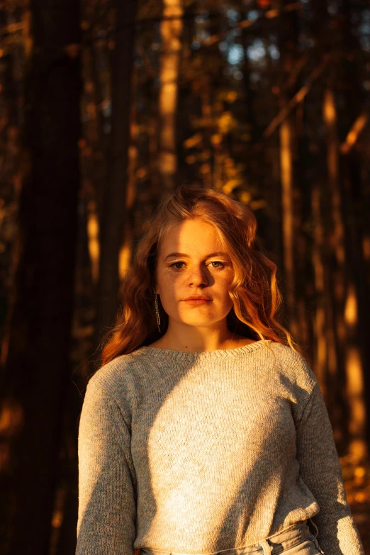 an image of a woman standing in the woods