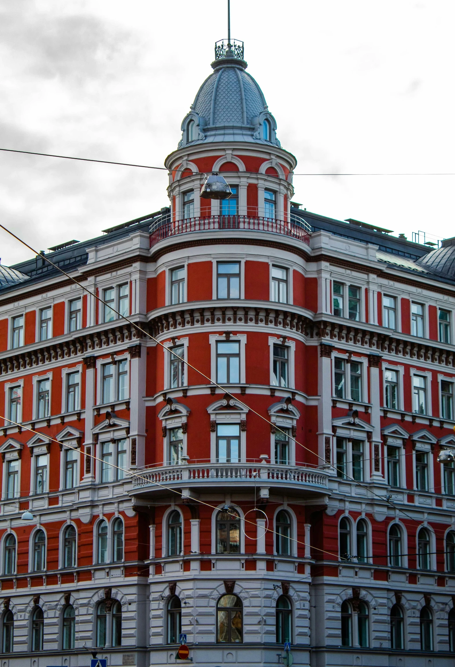 red and white building with an interesting dome on top