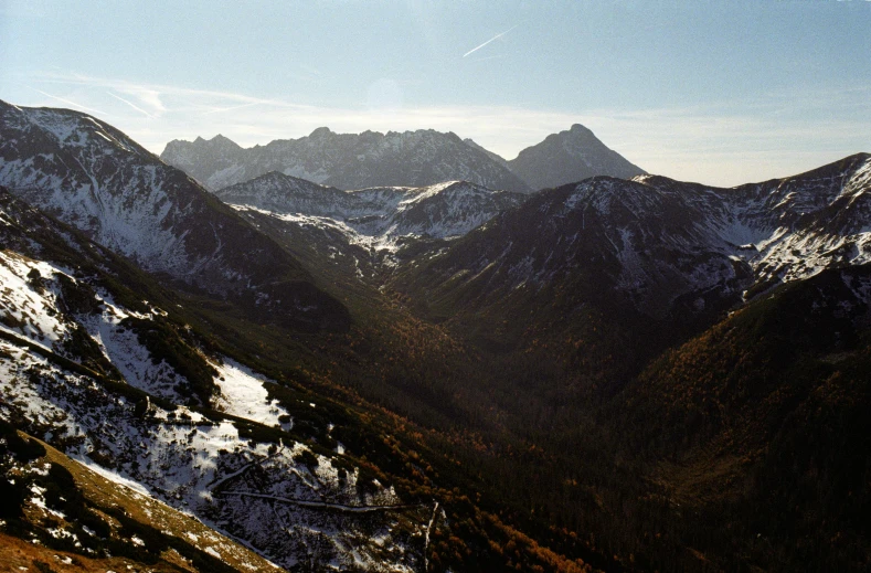 the high mountains can be seen in this view
