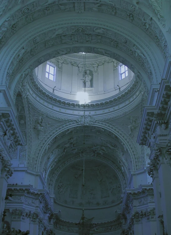 a church with vaulted ceiling and ornate walls