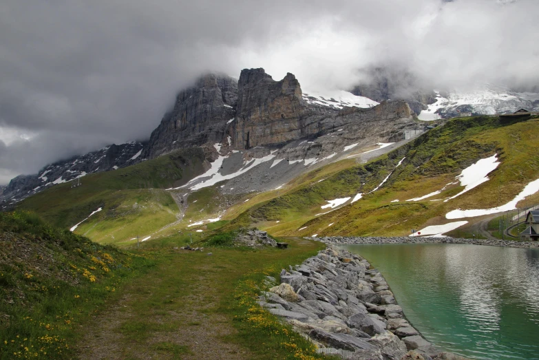 a mountain is seen in the distance with mountains on either side