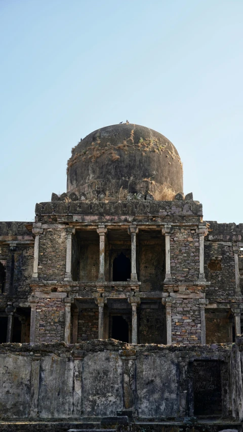 an old structure that has been built with bricks and rubble